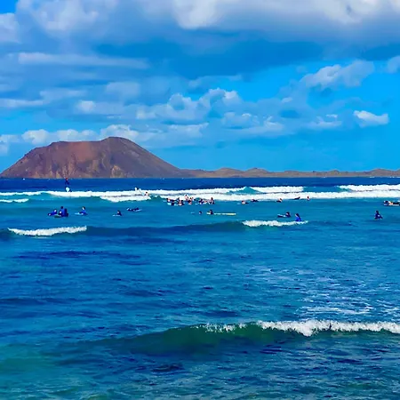 Holiday home Casa Dalia, Frontbeach, Piscina, Corralejo